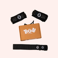Verpackung der Kindertrage mit Logo und Kindertrage ausgepackt  